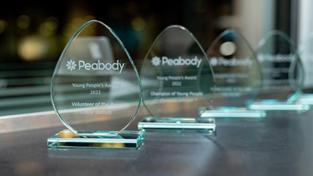 Four Peabody awards made of glass