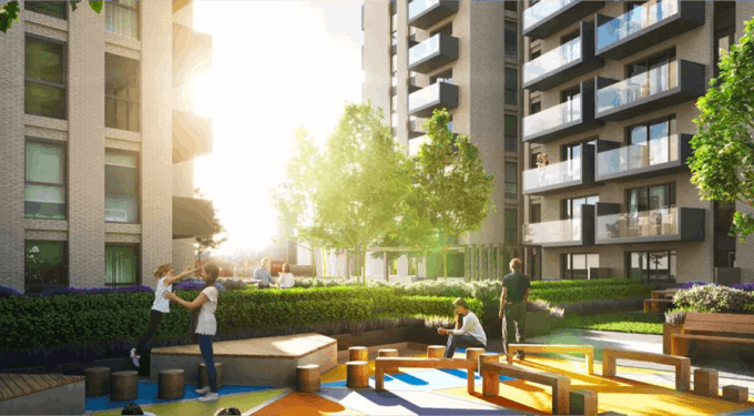 Outdoor space with buildings, trees and people standing