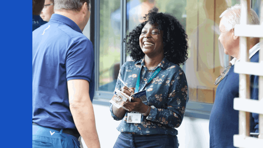 Woman laughing with two men