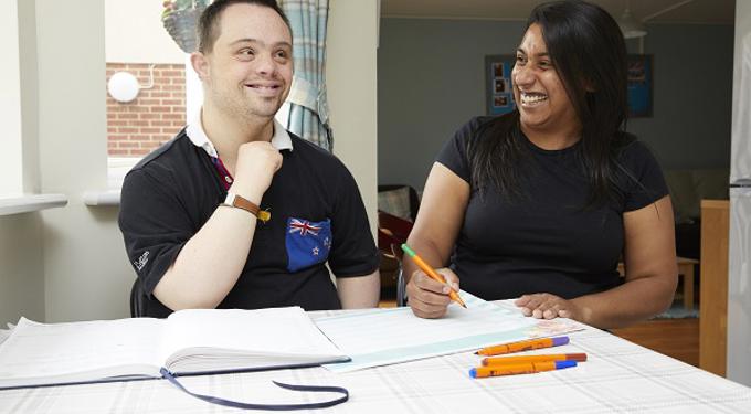 Two people smiling