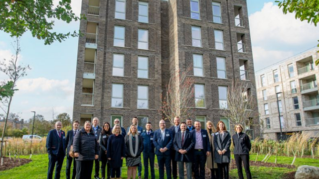 Group of people standing in front of a building