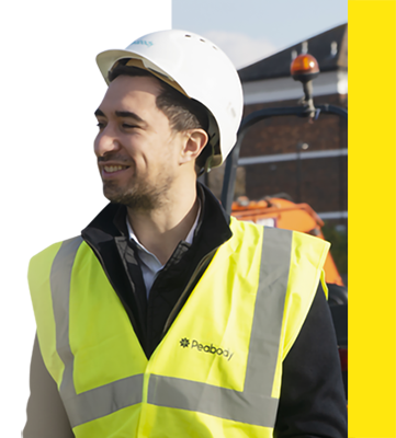 Man wearing a hard hat and yellow hi-vis jacket