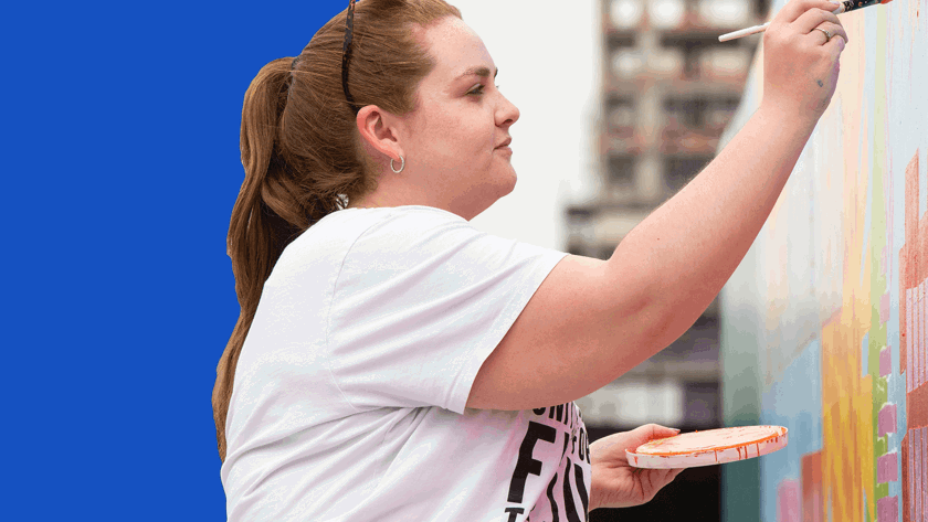 Woman wearing a white top, painting