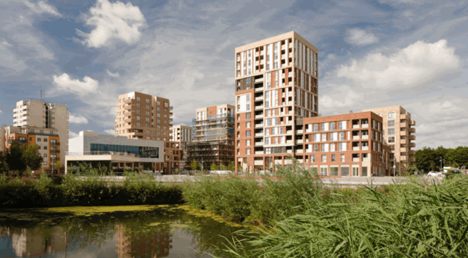 Outdoor space with buildings in the background and blue sky