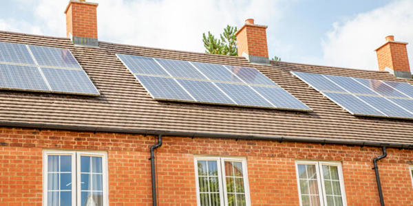 Solar panels on house roofs